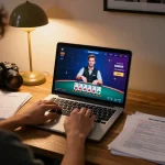 Player engaging in online blackjack with GA88 on screen, showcasing dealer interaction and gaming strategy