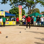 Dynamic petanque competition at fopikotabanjarma.org event, showcasing players and community engagement.
