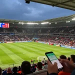 Lucky88 live betting scene with match odds, excited fans, and sports analysis.